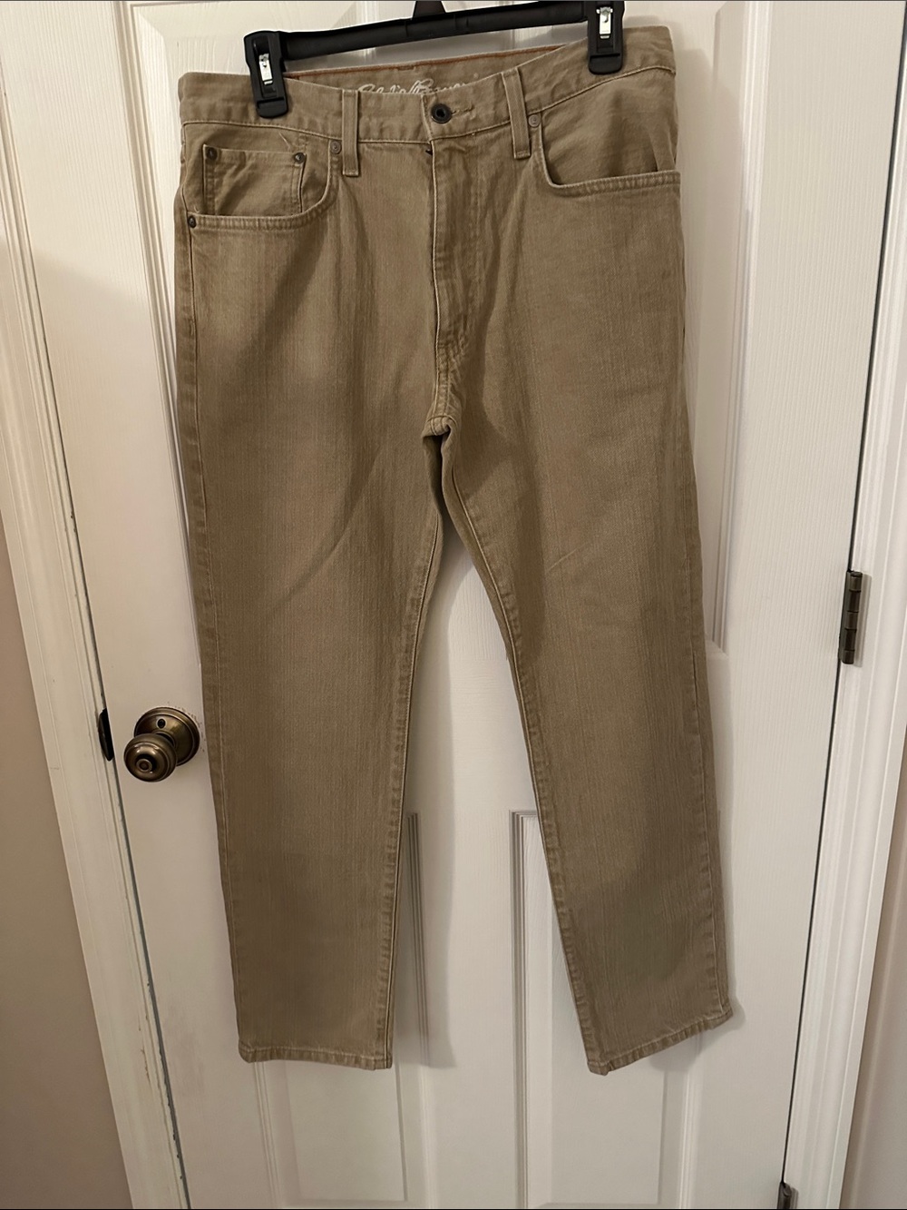 Eddie Bauer men’s Tan jeans with Black Leather Patch